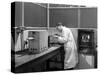 Lab Tachnician Using a Table Top Test Furnace, Sheffield, South Yorkshire, 1962-Michael Walters-Stretched Canvas