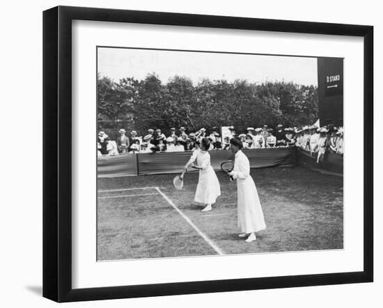 Ladies' Doubles Match at Wimbledon-null-Framed Photographic Print