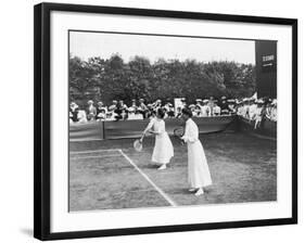 Ladies' Doubles Match at Wimbledon-null-Framed Photographic Print