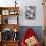 Ladles and Slotted Spoons Hanging up in a Kitchen-Huw Jones-Photographic Print displayed on a wall