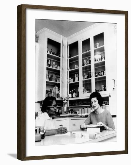 Lady Bird Johnson, in the Kitchen with Her African American Cook, Zephyr Wright-null-Framed Photo