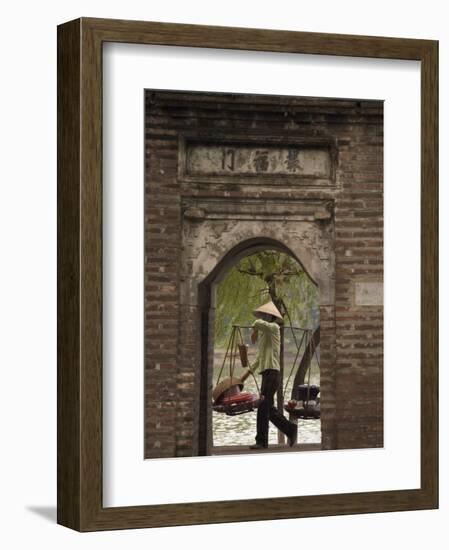 Lady Carrying Baskets, Hoan Kiem Lake, Hanoi, Northern Vietnam, Southeast Asia-Christian Kober-Framed Photographic Print