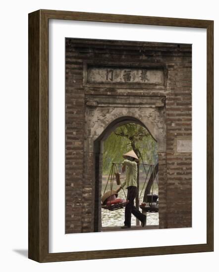Lady Carrying Baskets, Hoan Kiem Lake, Hanoi, Northern Vietnam, Southeast Asia-Christian Kober-Framed Photographic Print