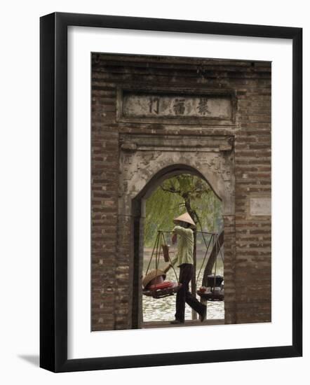 Lady Carrying Baskets, Hoan Kiem Lake, Hanoi, Northern Vietnam, Southeast Asia-Christian Kober-Framed Photographic Print