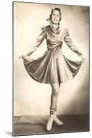 Lady Ice Skater in Tasteful Skirt-null-Mounted Art Print