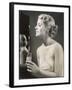 Lady in Her Slip Putting on Her Perfume Before Dressing-null-Framed Art Print
