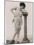 Lady in Her Undies and Gartered Stockings Leans Cheekily on a Pillar-null-Mounted Photographic Print