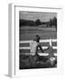 Lady Painting the Fence-Nina Leen-Framed Photographic Print