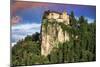 Lake Bled Castle rises on cliffs above Lake Bled, Slovenia at sunset-Miva Stock-Mounted Photographic Print