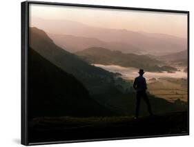 Lake District Dawn Rises in a Lakeland Pass Watched by Man in Hat-null-Framed Photographic Print