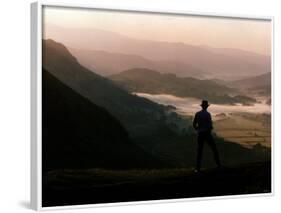 Lake District Dawn Rises in a Lakeland Pass Watched by Man in Hat-null-Framed Photographic Print