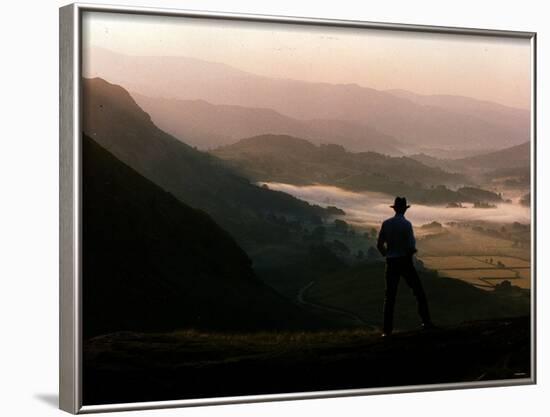 Lake District Dawn Rises in a Lakeland Pass Watched by Man in Hat-null-Framed Photographic Print