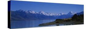 Lake in Front of a Mountain Range, Lake Pukaki, Mt. Cook, Southern Alps, New Zealand-null-Stretched Canvas