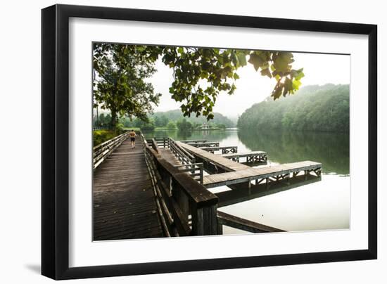 Lake Lure, North Carolina: a Man Goes for a Run Along the Shoreline of Lake Lure-Brad Beck-Framed Photographic Print