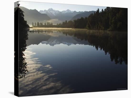 Lake Matheson in the Evening Reflecting Mount Tasman and Aoraki, South Island, New Zealand-Christian Kober-Stretched Canvas