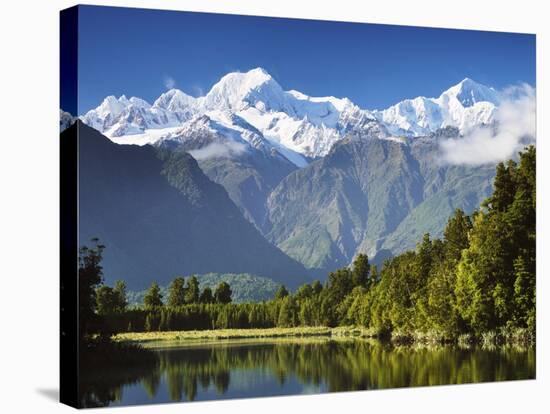 Lake Matheson, Mount Tasman and Mount Cook, Westland Tai Poutini National Park, New Zealand-Jochen Schlenker-Stretched Canvas