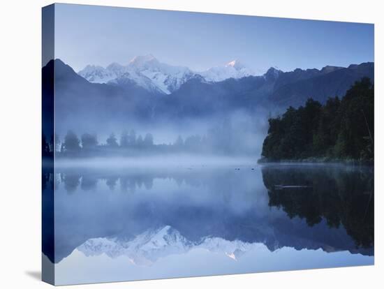 Lake Matheson, Mount Tasman and Mount Cook, Westland Tai Poutini National Park, New Zealand-null-Stretched Canvas