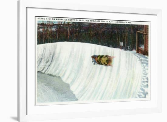 Lake Placid, New York - Riding the Whiteface Curve on the Olympic Bobsled Run-Lantern Press-Framed Premium Giclee Print