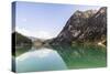 Lake Prags, Prags Dolomites, South Tyrol, Italy: A Rowing Boat On Lake Prags-Axel Brunst-Stretched Canvas