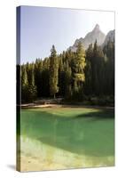 Lake Prags, Prags Dolomites, South Tyrol, Italy: The Lake, Trees And A Mountain Peak In The Sun-Axel Brunst-Stretched Canvas