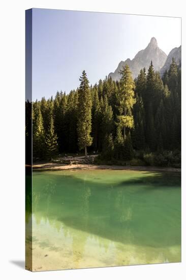 Lake Prags, Prags Dolomites, South Tyrol, Italy: The Lake, Trees And A Mountain Peak In The Sun-Axel Brunst-Stretched Canvas