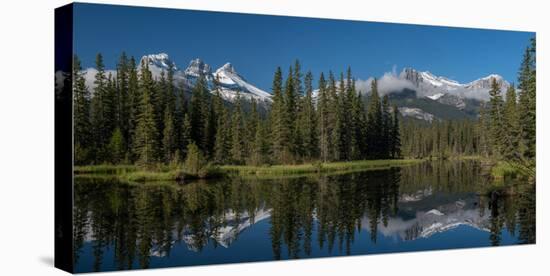 Lake with mountains in background, Three Sisters Mountain, Mount Lawrence Grassi, Canmore, Alber...-null-Stretched Canvas