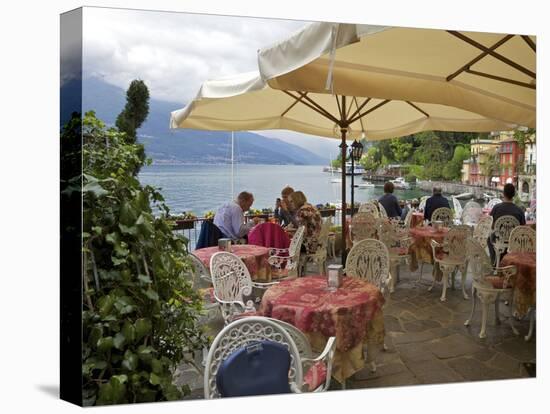 Lakeside View of Cafe in Medieval Village of Varenna, Lake Como, Lombardy, Italian Lakes, Italy-Peter Barritt-Stretched Canvas