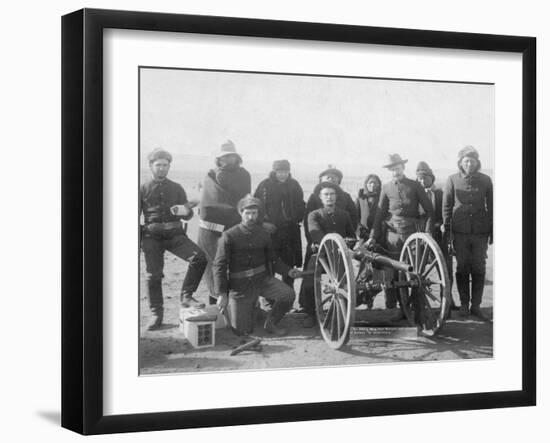 Lakota Scouts and White Soldiers Posed Behind Hotchkiss Gun Photograph - Wounded Knee, SD-Lantern Press-Framed Art Print