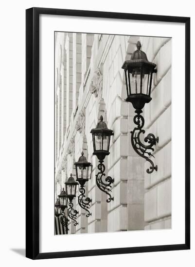 Lamps on Side of Building-Christian Peacock-Framed Art Print