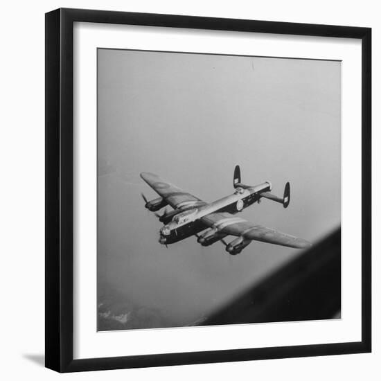 Lancaster Bomber in Flight-null-Framed Premium Photographic Print