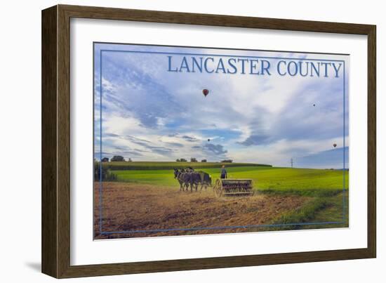 Lancaster County, Pennsylvania - Amish Farmer and Hot Air Balloons-Lantern Press-Framed Art Print