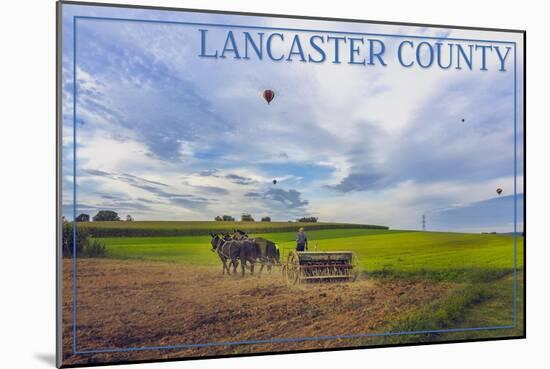 Lancaster County, Pennsylvania - Amish Farmer and Hot Air Balloons-Lantern Press-Mounted Art Print