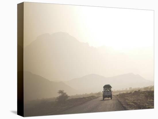 Land Cruiser Driving Along Dusty Road, Between Zagora and Tata, Morocco, North Africa, Africa-Jane Sweeney-Stretched Canvas