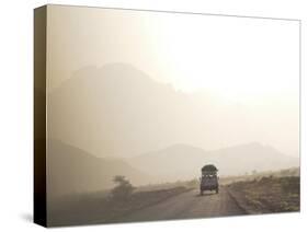 Land Cruiser Driving Along Dusty Road, Between Zagora and Tata, Morocco, North Africa, Africa-Jane Sweeney-Stretched Canvas