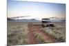 Land Rover Game Vehicle Parked by Sand Road at Sunrise-Lee Frost-Mounted Photographic Print