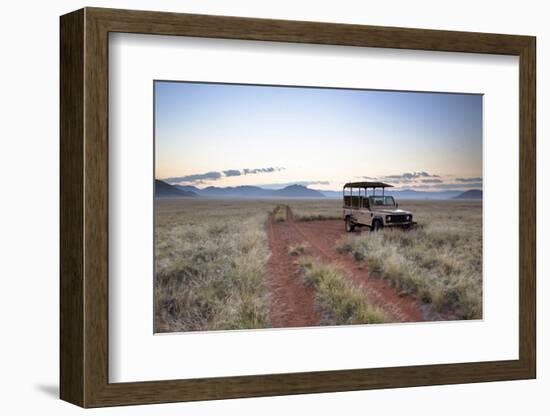 Land Rover Game Vehicle Parked by Sand Road at Sunrise-Lee Frost-Framed Photographic Print