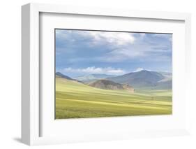 Landscape of the green Mongolian steppe under a gloomy sky, Ovorkhangai province, Mongolia, Central-Francesco Vaninetti-Framed Photographic Print