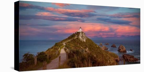 Landscape View with Sunset Scene of the Catlins, Nugget Point Lighthouse, South Island, New Zealand-Sasithorn Phuapankasemsuk-Stretched Canvas