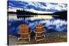 Landscape with Adirondack Chairs on Shore of Relaxing Lake at Sunset in Algonquin Park, Canada-elenathewise-Stretched Canvas