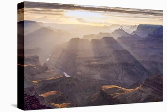 Landscape with sunbeams over Grand Canyon at sunset, Lipan Point, South Rim, Arizona, USA-Panoramic Images-Stretched Canvas