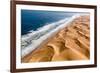 Langewand, Aerial view of where the Atlantic Ocean meets the sea of dunes in Western Namibia.-ClickAlps-Framed Photographic Print