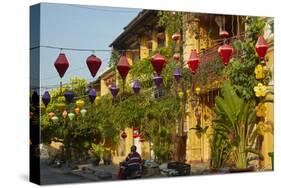 Lanterns and restaurants, Hoi An, Vietnam-David Wall-Stretched Canvas