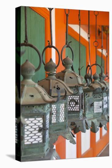 Lanterns at Kasuga Taisha Shrine (Unesco World Heritage Site) at Dusk, Nara, Kansai, Japan-Ian Trower-Stretched Canvas