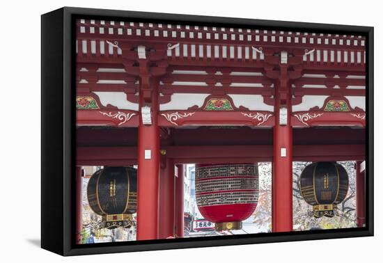 Lanterns hanging from a gate to the entrance of the Buddhist Temple-Sheila Haddad-Framed Stretched Canvas