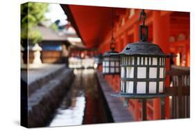 Lanterns in Itsukushima Shrine, Miyajima, Hiroshima Prefecture, Japan.-Iwashi Spirit-Stretched Canvas