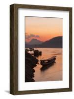 Laos, Luang Prabang, boats on Mekong River at sunset.-Merrill Images-Framed Photographic Print