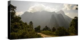 Laos, Vang Vieng. Dirt Road and Mountains-Matt Freedman-Stretched Canvas