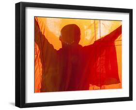 Laos, Vientiane, Monk Hanging Robes-Steve Vidler-Framed Photographic Print