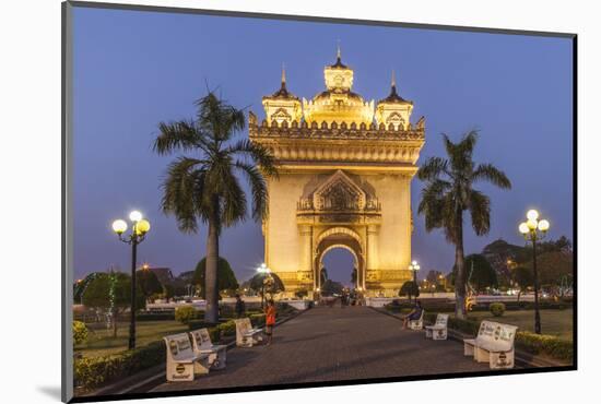 Laos, Vientiane. Patuxai, Victory Monument exterior at dusk.-Walter Bibikow-Mounted Photographic Print