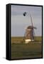 Lapwing (Vanellus Vanellus) Flying Past Windmill, Texel, Netherlands, May 2009-Peltomäki-Framed Stretched Canvas